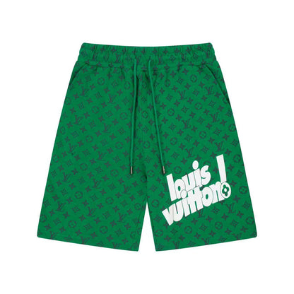 Green all-over logo shorts