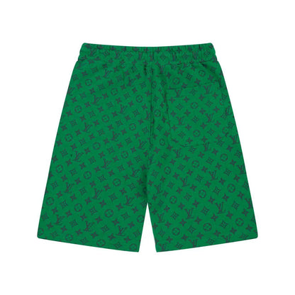 Green all-over logo shorts