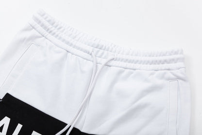 Black and white patchwork letter embroidered shorts